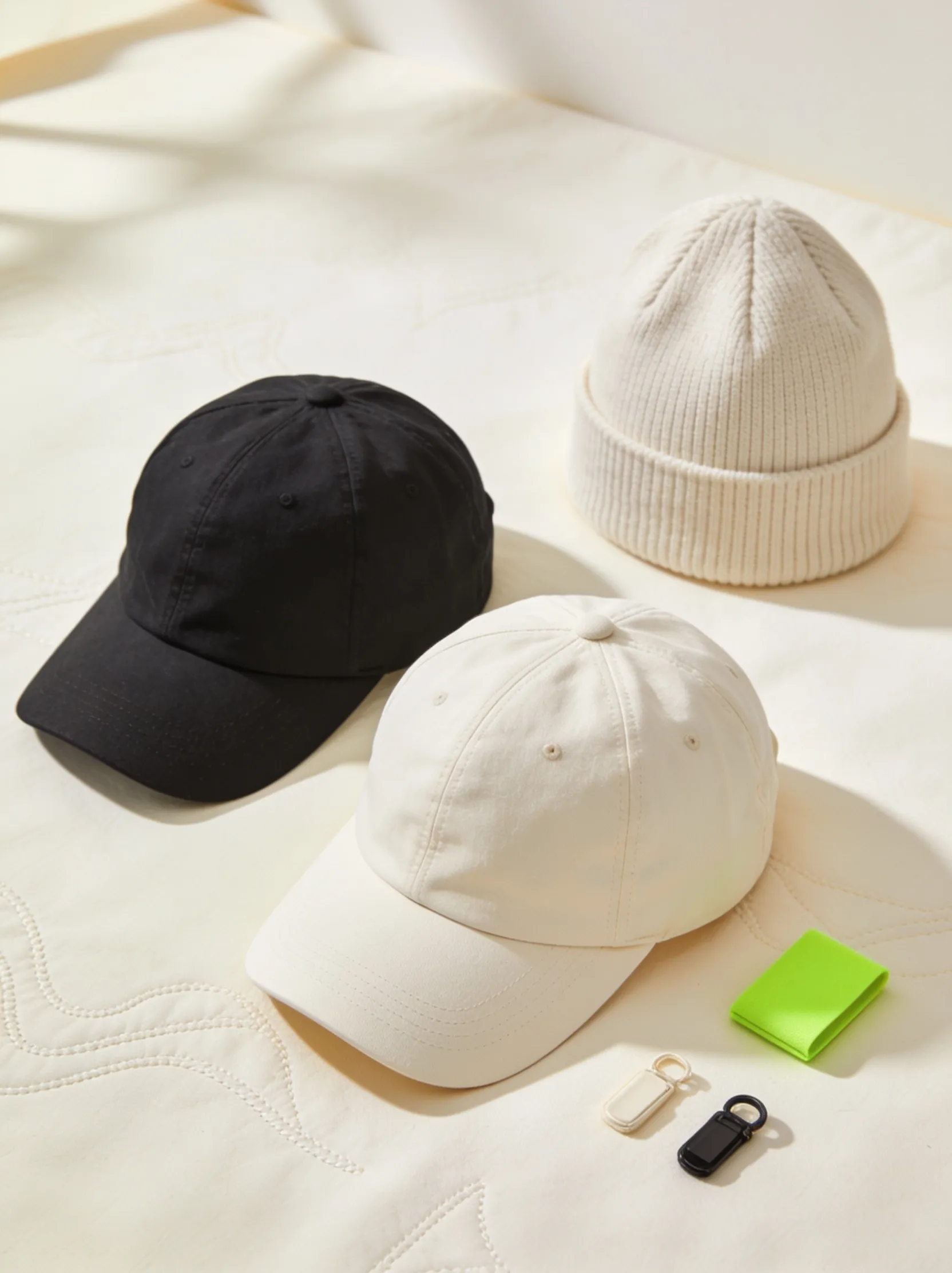 Branded caps and headwear with embroidered logo detail