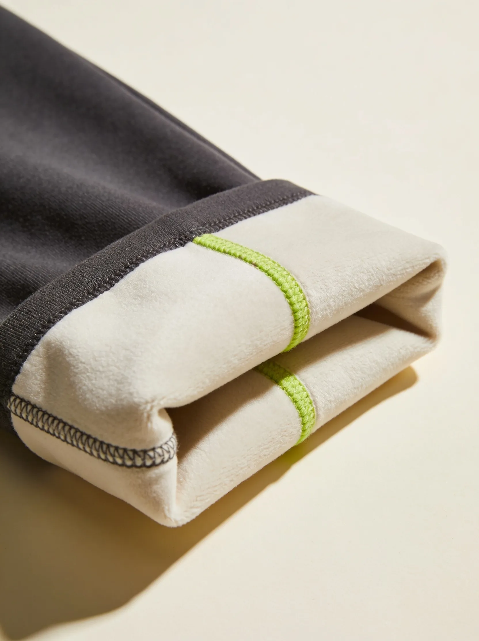 Limited edition apparel drop folded and styled in signature brand colours